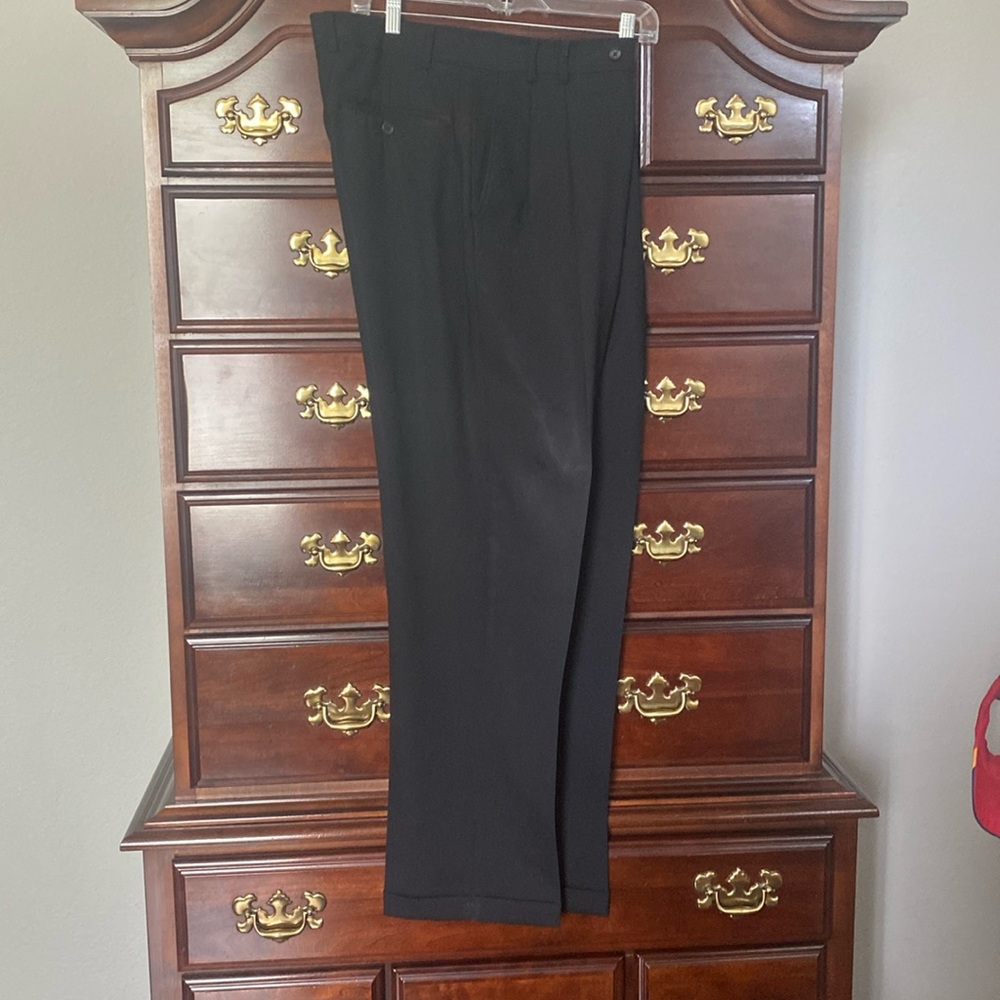 Black pleated front dress slacks for men